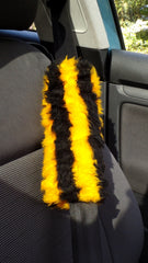 Fuzzy faux fur seatbelt pads in a choice of print's Bee
