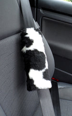Fuzzy faux fur seatbelt pads in a choice of print's Black & white cow
