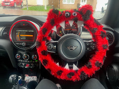 Fuzzy faux fur ladybird red and black spotty monster steering wheel cover