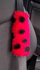 Fuzzy faux fur seatbelt pads in a choice of print's ladybug