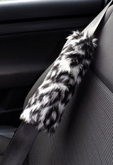 Fuzzy faux fur seatbelt pads in a choice of print's Snow Leopard