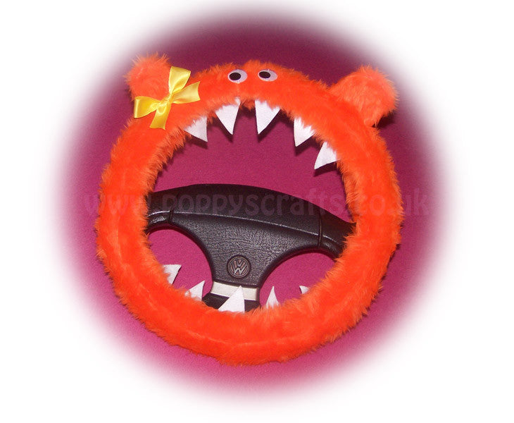 Fuzzy faux fur Tangerine Orange Monster steering wheel cover with cute yellow bow Poppys Crafts